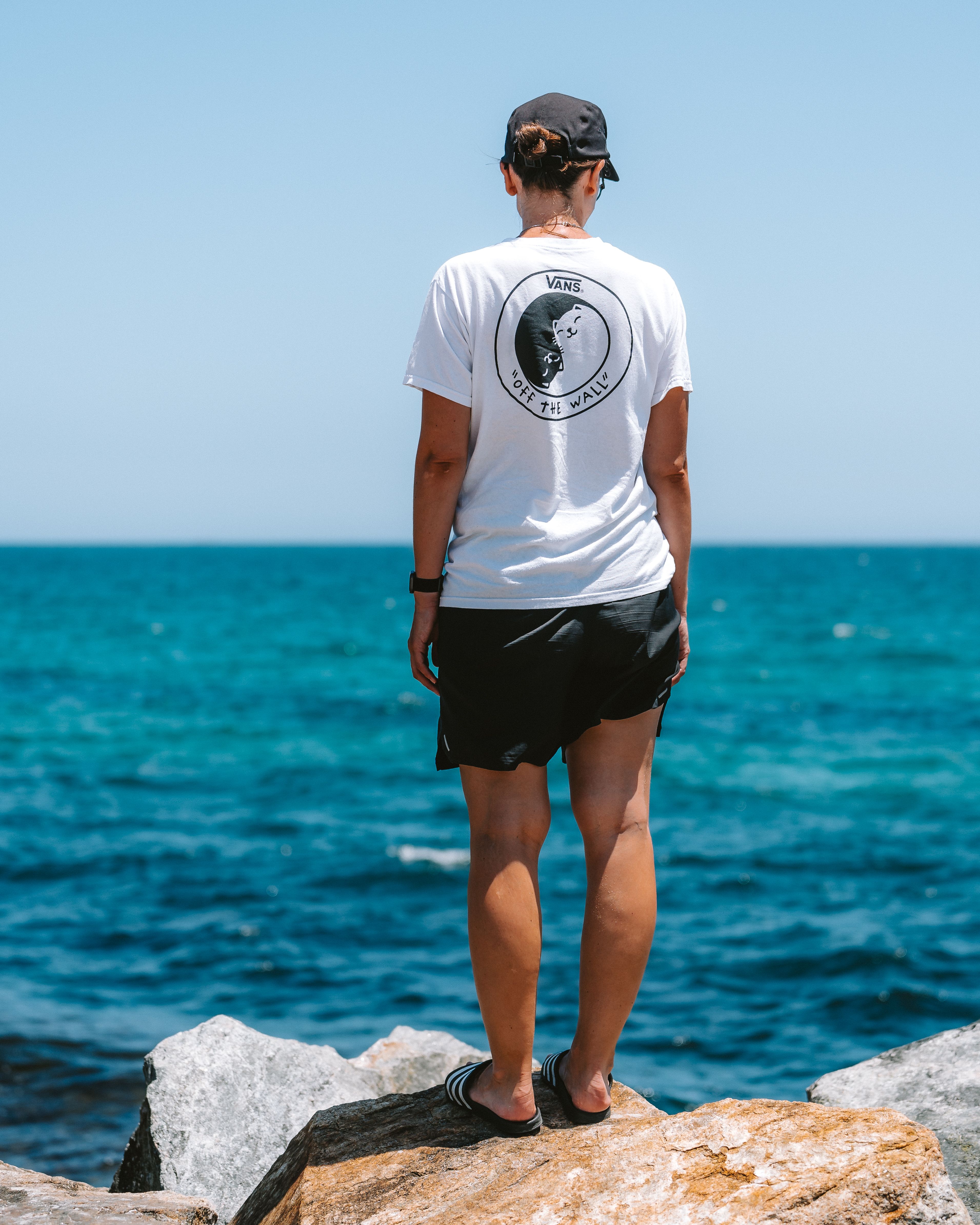A person enjoying a serene moment by the ocean at Cottesloe Beach, Australia.